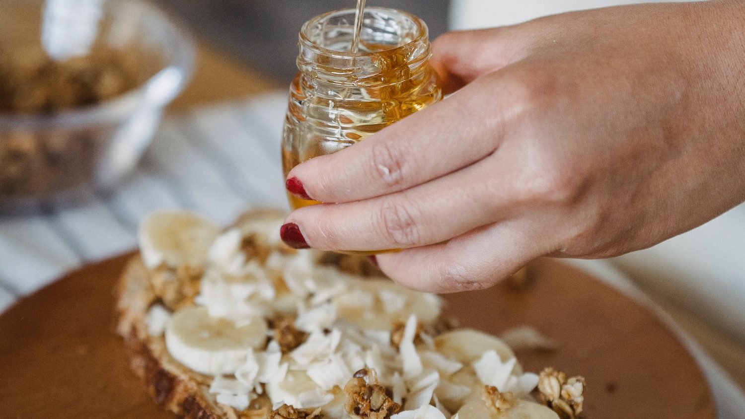 Honey drizzled onto banana bread